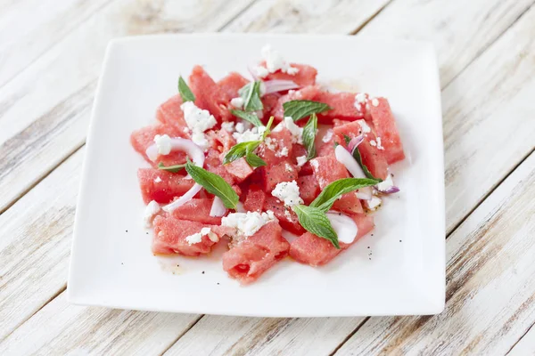 Watermelon salad with feta cheese and mint — Stock Photo, Image