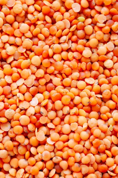 Red Lentils tekstury tło pełna ramka. Tekstura czerwonej soczewicy. — Zdjęcie stockowe