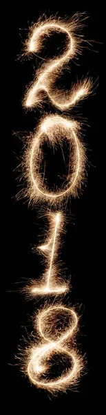 Isolated 2018 written with Sparkler firework on black Royalty Free Stock Images