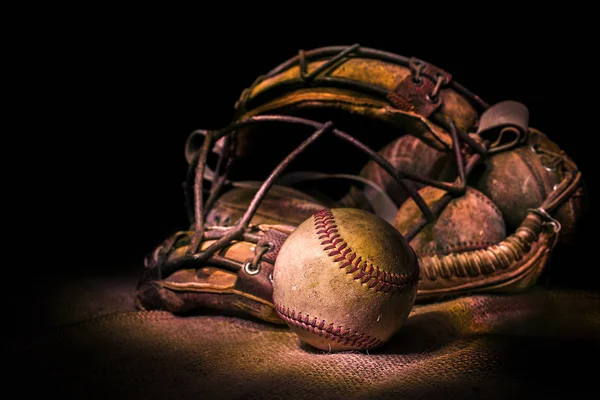 Antike Fangmaske mit Baseball Stockfoto