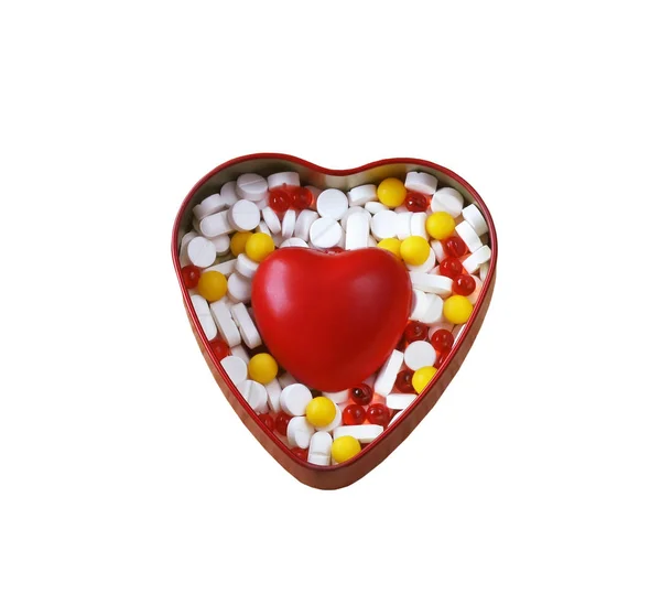 Schachtel Pillen und rotes Herz — Stockfoto
