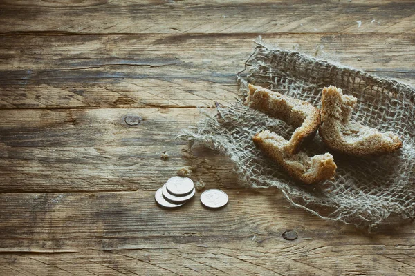 Three crust of bread on canvas cloth — Stock Photo, Image