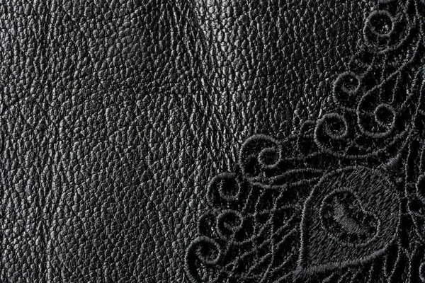 Detail of black lace on leather, macro — Stock Photo, Image