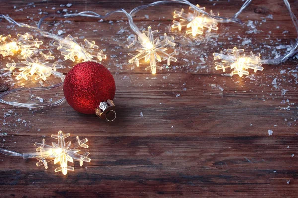 Frohe Weihnachten, Neujahrsgrußkarte, Girlanden leichte Schneeflocke — Stockfoto