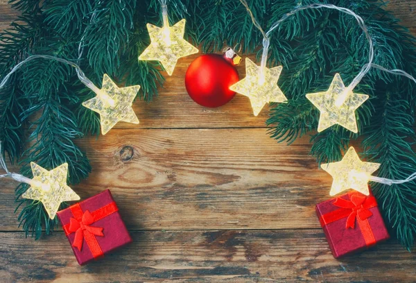 Navidad, tarjeta de felicitación de año nuevo, ramas de abeto, luz de la estrella g —  Fotos de Stock