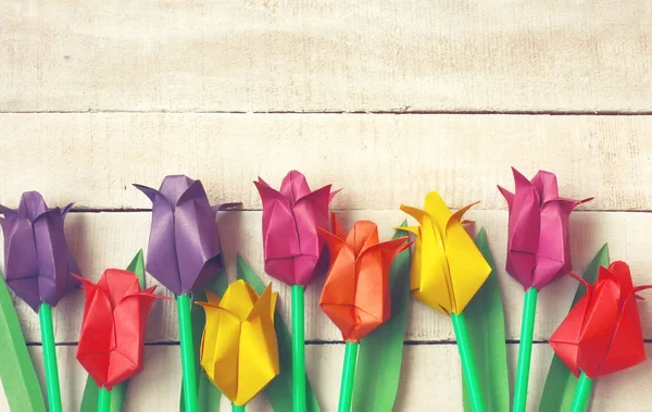 Veelkleurige origami tulpen bloemen grens — Stockfoto