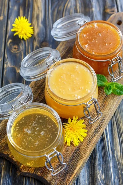 Linden,flower and buckwheat honey in jars.