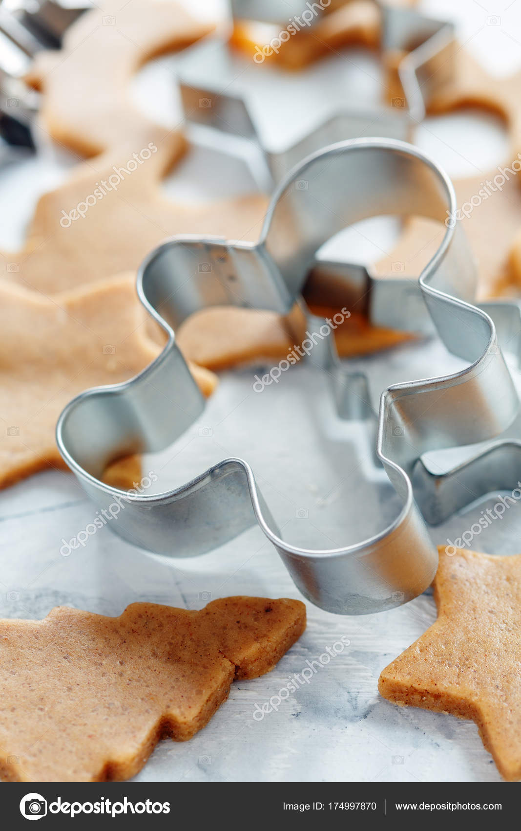 cutters for christmas cookies and the dough for gingerbread on the kitchen table selective focus photo by sriba3 - Metal Christmas Cookie Cutters cutters for christmas cookies and the dough for gingerbread on the kitchen table selective focus photo by sriba3 - Metal Christmas Cookie Cutters
