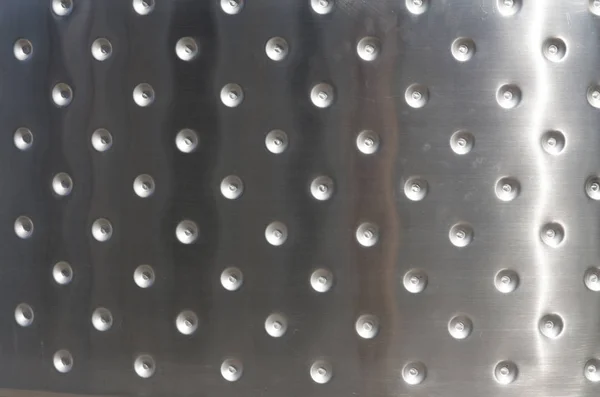 Metallplatten mit Nieten Hintergrund oder Textur Foto — Stockfoto