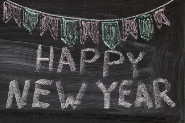 Feliz Ano Novo escrito no quadro negro — Fotografia de Stock
