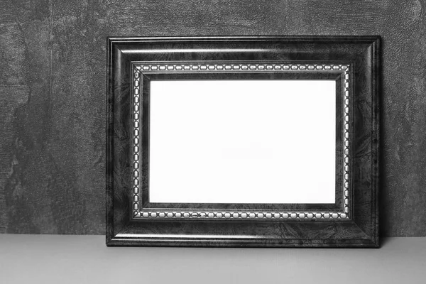 Vintage frame on table — Stock Photo, Image