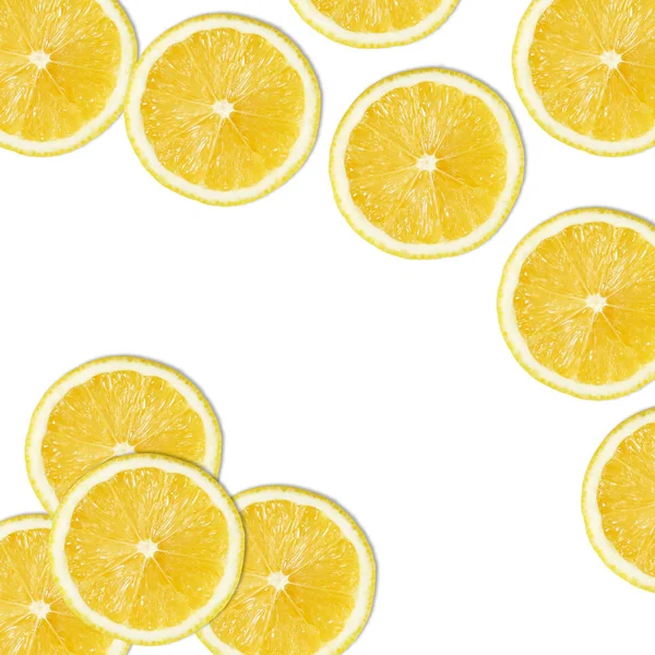 Rodajas de limón amarillo sobre blanco — Foto de Stock