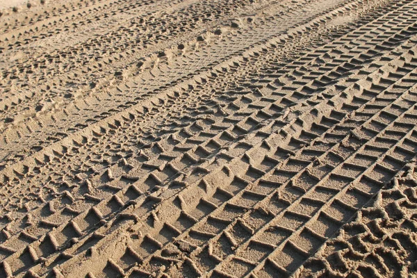 Achtergrond afdrukken in zand — Stockfoto