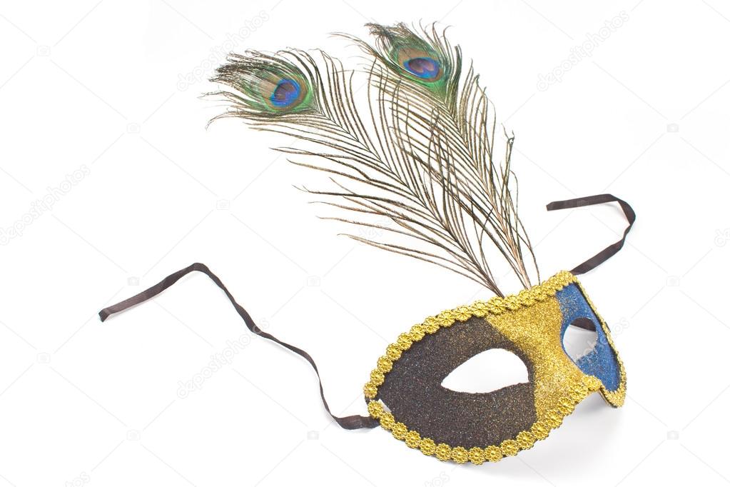 Carnival mask with peacock feathers isolated on white