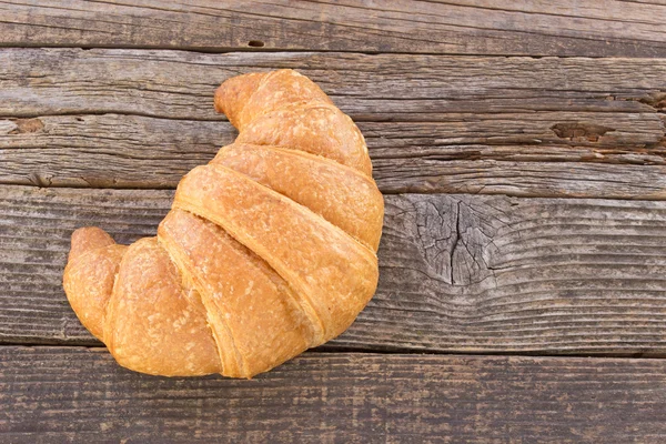 Croissant fa háttér — Stock Fotó