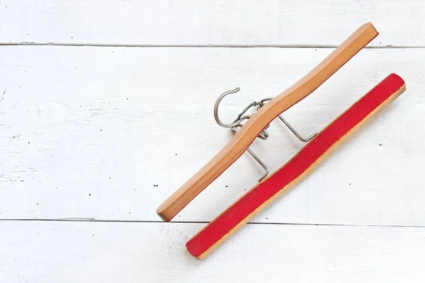 Wooden hanger for trousers on white background — Stock Photo, Image