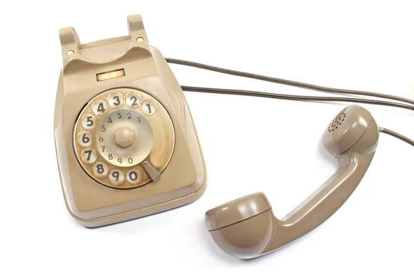 用白色隔离的旧电话 — 图库照片