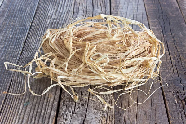 Hank di paglia di canapa su sfondo di legno — Foto Stock