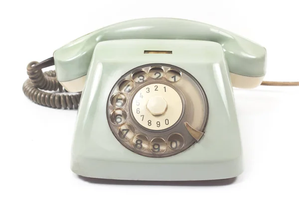 Viejo teléfono aislado sobre fondo blanco —  Fotos de Stock
