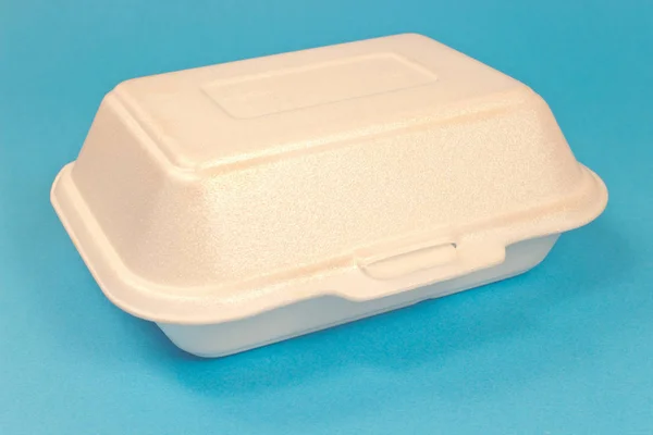 Styrofoam box for food isolated on blue background — Stock Photo, Image