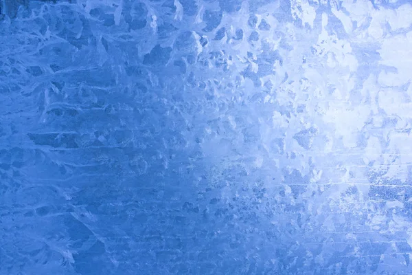 Ice pattern on window glass in winter time — Stock Photo, Image