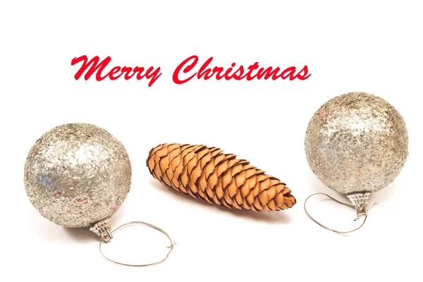 Merry Christmas with pine cone and baubles isolated on white — Stock Photo, Image