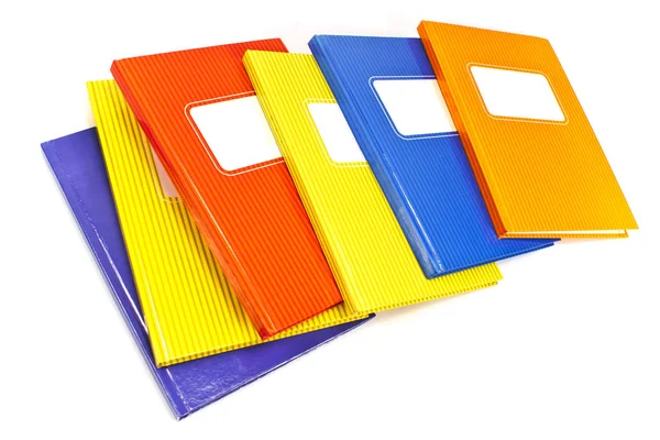 Cuadernos coloridos aislados sobre fondo blanco — Foto de Stock