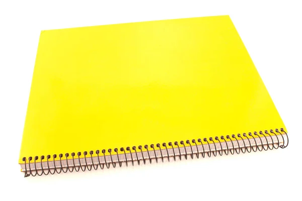 黄色螺旋笔记本电脑被隔离在白色 — 图库照片