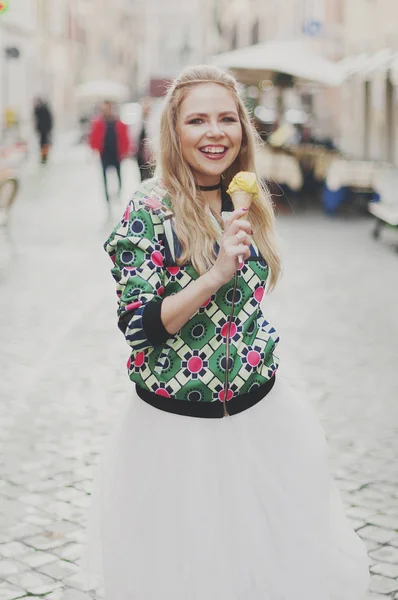 Happy hipster woman eating ice-cream in Rome