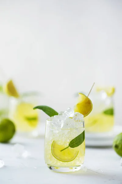 Summer cocktail with sage and lime