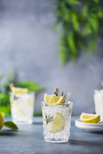 lemon soda cocktail with rosemary