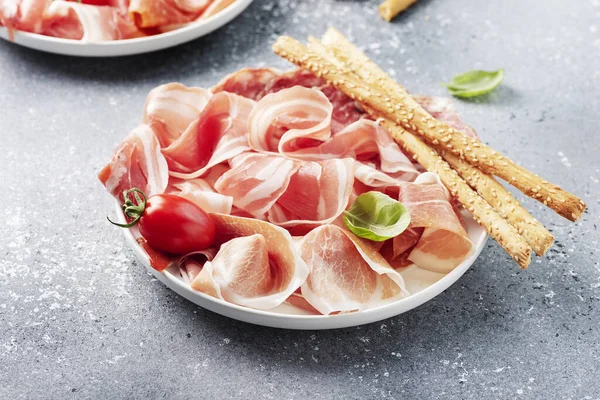 Traditional Italian Antipasto Ham Salami Bread Sticks Selective Focus Image — Stock Photo, Image