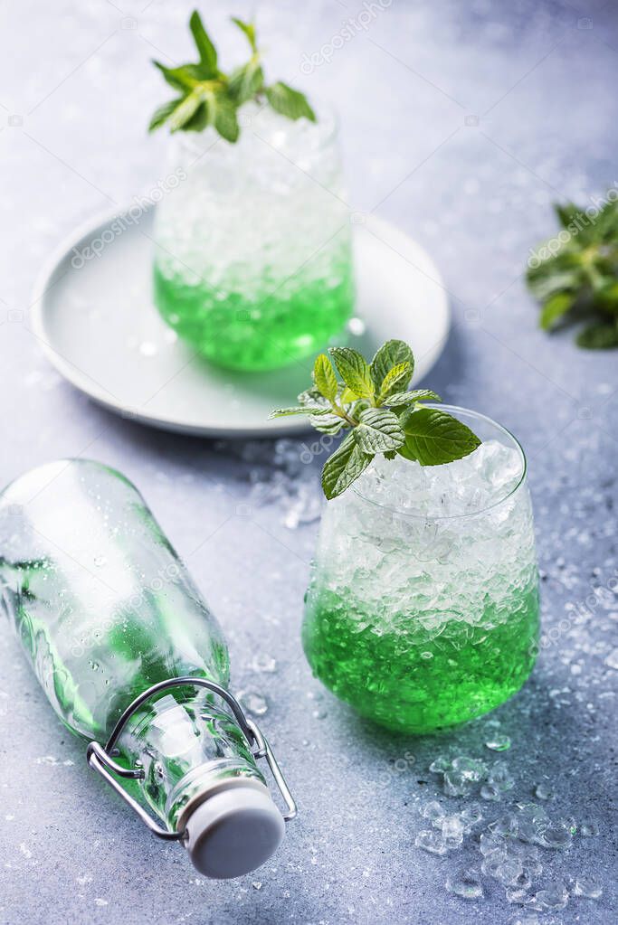 Summer cocktail with mint and crushed ice, selective focus image