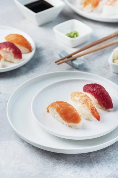 Mix of Traditional Japanese sushi on the light background, selective focus image