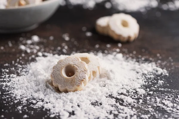 Sweet homemade cookies with powdered sugar, selective focus image