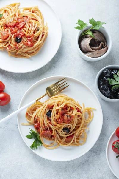 Traditional Italian Pasta Tomato Olives Capers Anchovies Parsley Top View — Stock Photo, Image