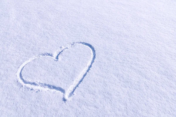 Forma del corazón en la nieve Imagen De Stock