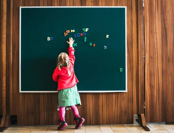 Young Girl School Some Letters Blackboard — Stock Photo, Image