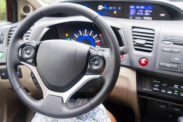 Car wheel with dashboard — Stock Photo, Image
