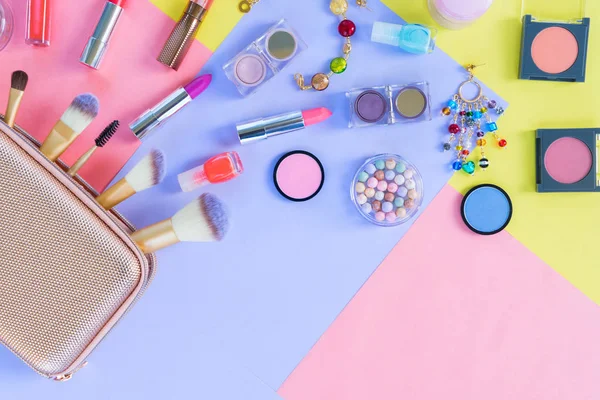 Colorful make up flat lay scene — Stock Photo, Image