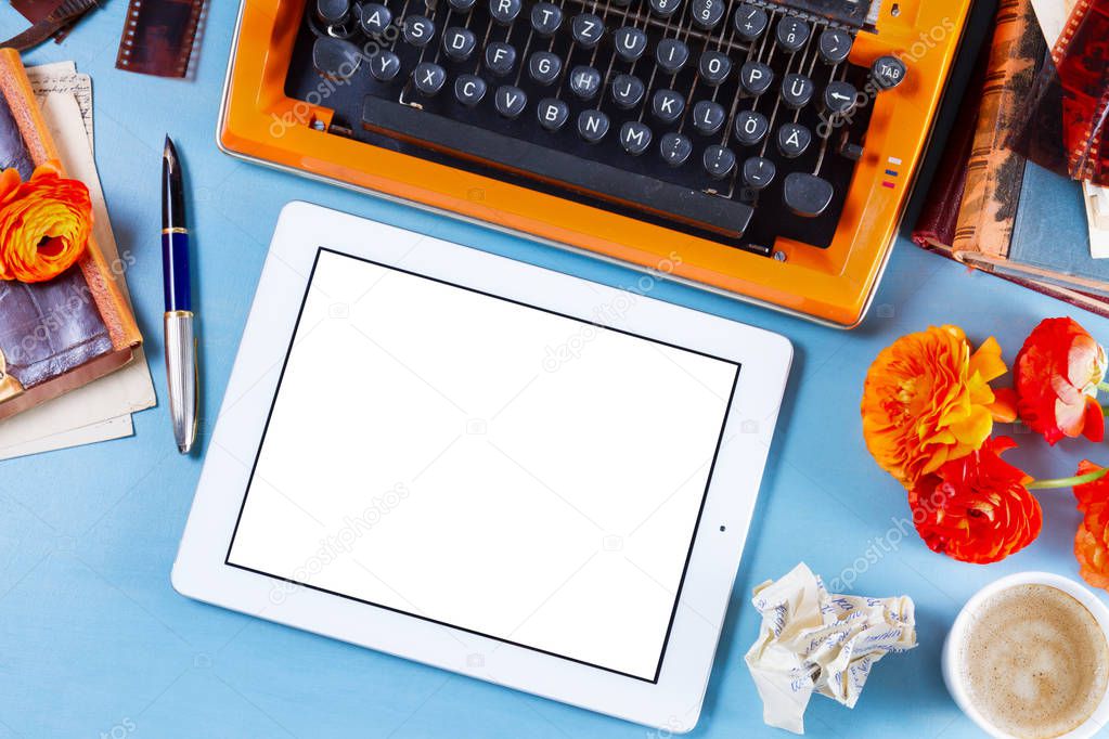 Workspace with vintage orange typewriter