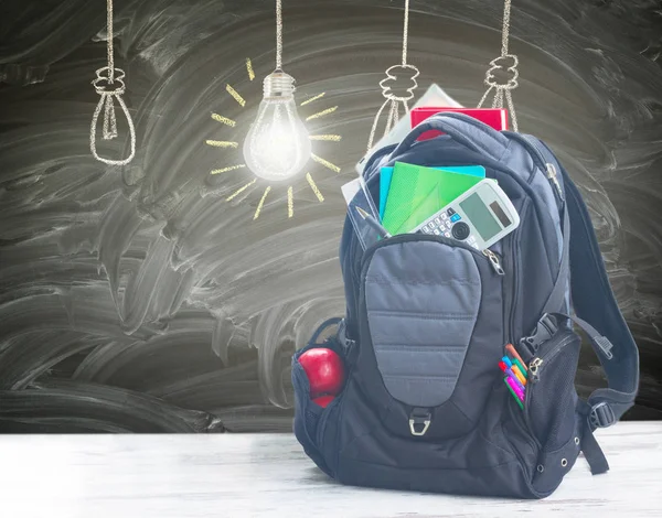 School backpack with supplies — Stock Photo, Image