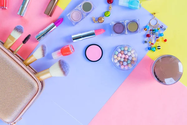 Colorful make up flat lay scene — Stock Photo, Image