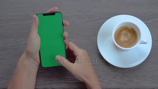 Hand holding phone — Stock Video