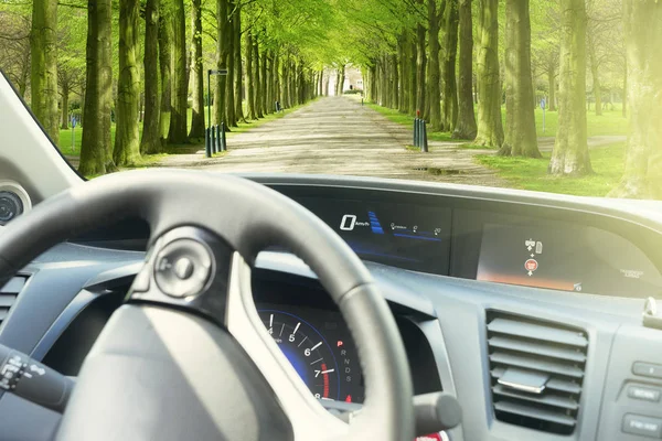 Car windscreen with road — Stock Photo, Image