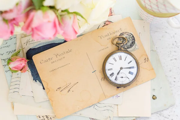 Antique mail and clock Stock Picture