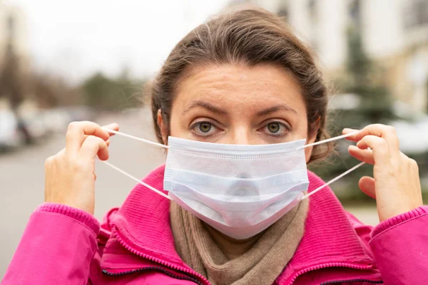 woman wearing virus protection mask