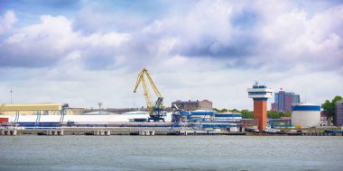 Oil station  in seaport Klaipeda clipart