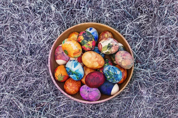 Wooden bowl with easter eggs
