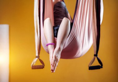 Antigravity yoga in hammock clipart